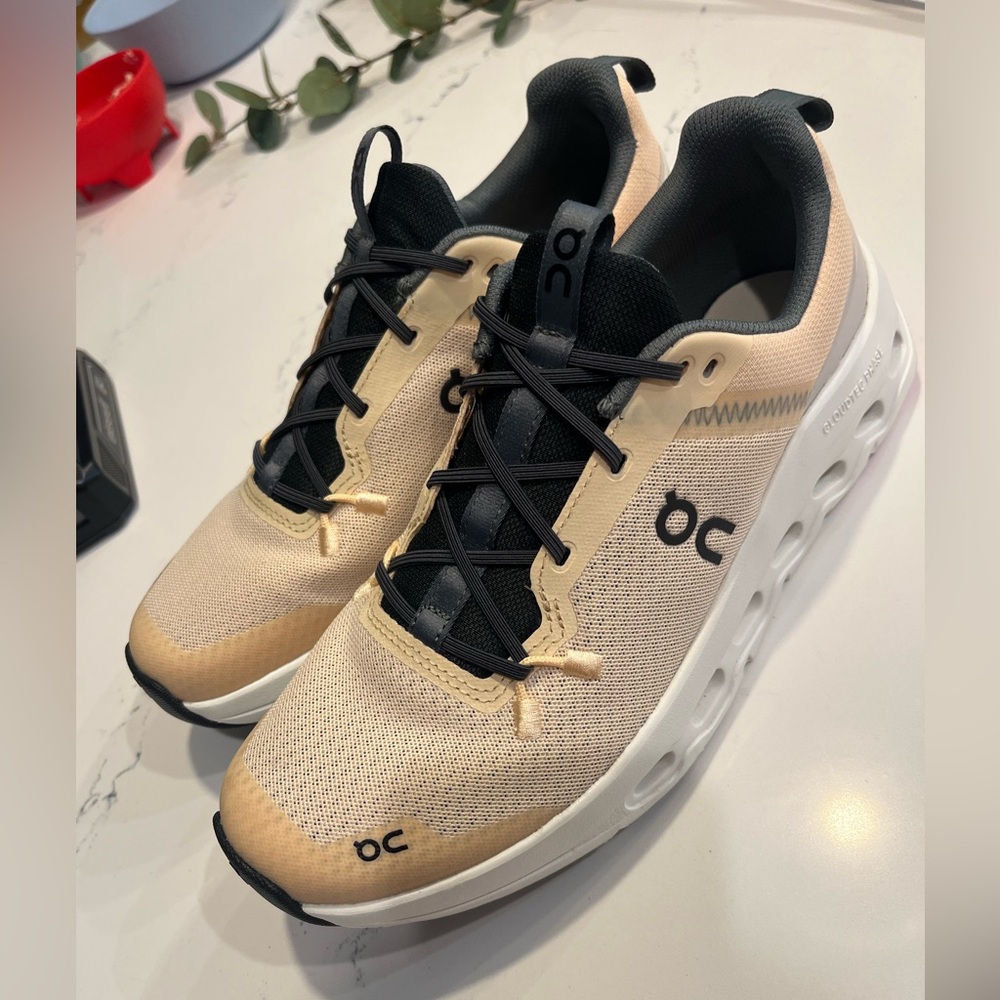 On Running Blonde and Ivory Sneakers